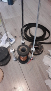 Gluing the threaded rods to the coil with the tee fittings